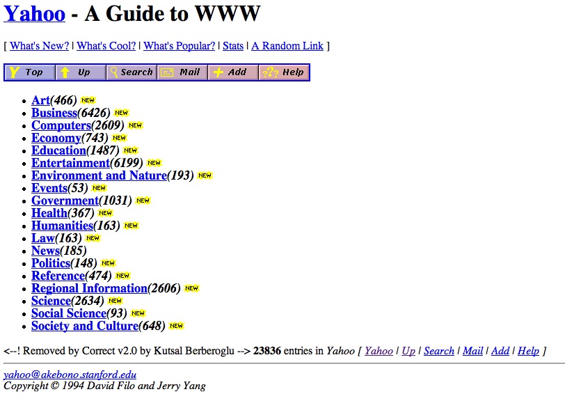 Retro computer showing Yahoo! logo with folders representing its web directory days